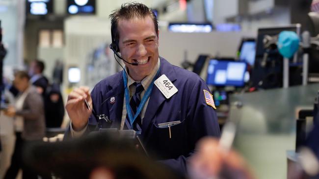 Trader Gregory Rowe works on the floor of the New York Stock Exchange, Wednesday, Aug. 26, 2015. U.S. stocks closed sharply higher, giving the stock market its best day in close to four years. The Dow Jones industrial average climbed 619 points, or 4 percent on Wednesday. (AP Photo/Richard Drew)