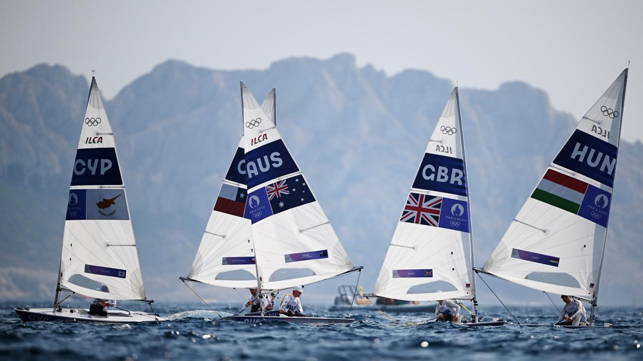 Finally underway: from left, Pavlos Kontides of Team Cyprus, Matt Wearn of Team Australia, Michael Beckett of Team Great Britain and Jonatan Vadnai of Team Hungry compete in the men's dinghy ILCA medal race on Day 12 in Marseille, France. Picture: Clive Mason/Getty Images