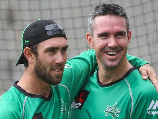Melbourne Stars cricketers training at the MCG nets.Coach Stephen Fleming comes in to chat with two of his stars Glenn Maxwell and Kevin Pietersen.Picture:Ian Currie