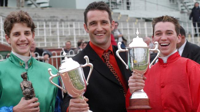 Trainer Roy Rogers (centre) at the races in 2003.