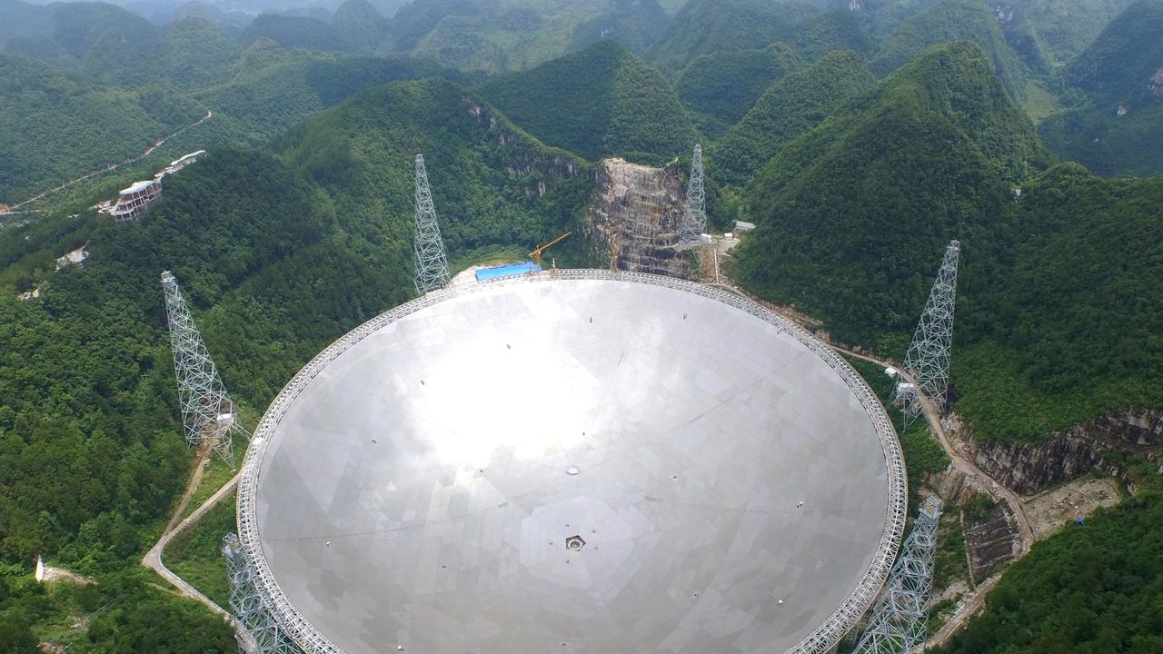 Scientists are developing a new transmission to send out into the stars to let aliens know where we are. The Five hundred metre Aperture Spherical Telescope in China is one of the two telescopes that would transmit the message.