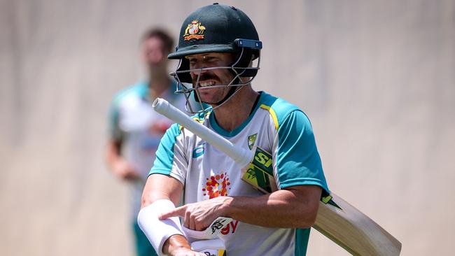 David Warner grimaces during a limited session in the Adelaide Oval nets