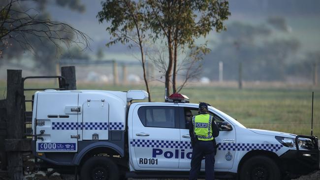 A police roadblock on the road to the property. Photo by Michael Wilson, The West Australian.