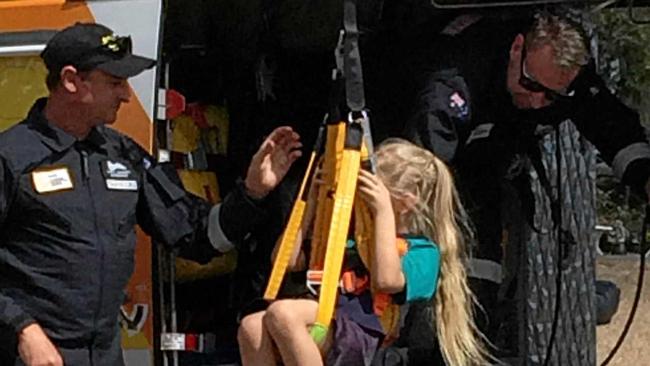 Amelia  Ward from Gogango State School gets winched into the RACQ rescue helicopter. Picture: contributed