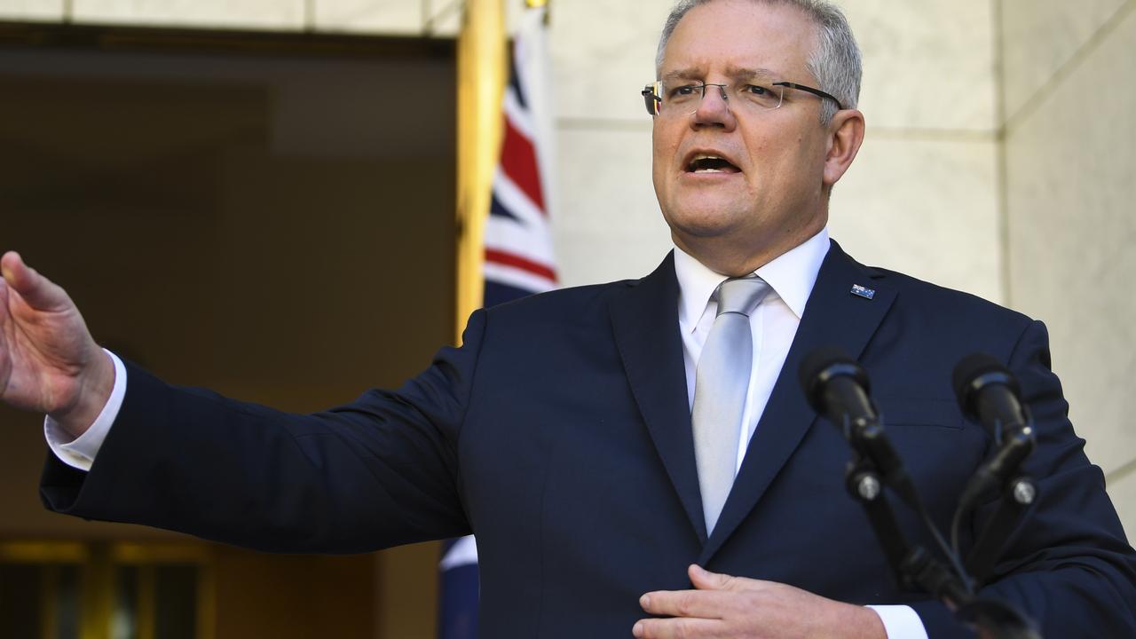 Scott Morrison during his historic press conference at Parliament House in Canberra yesterday. Picture: Lukas Coch/AAP