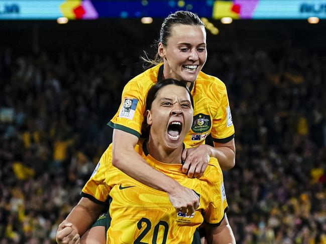 Sam Kerr and Hayley Raso celebrate Kerr’s goal during the World Cup semi-final. Picture: Daniela Porcelli/Eurasia Sport Images/Getty Images.