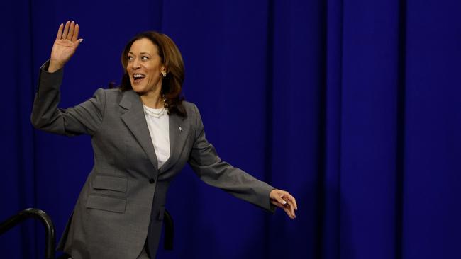 Vice-President Kamala Harris waves as she arrives on stage to deliver remarks on reproductive rights. Picture: Getty Images