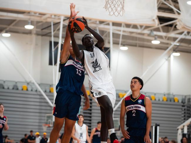 Newington College big man Goc Malek goes up for a lay-up in the Australian Basketball Schools Championship. Picture: Nelson Kahler