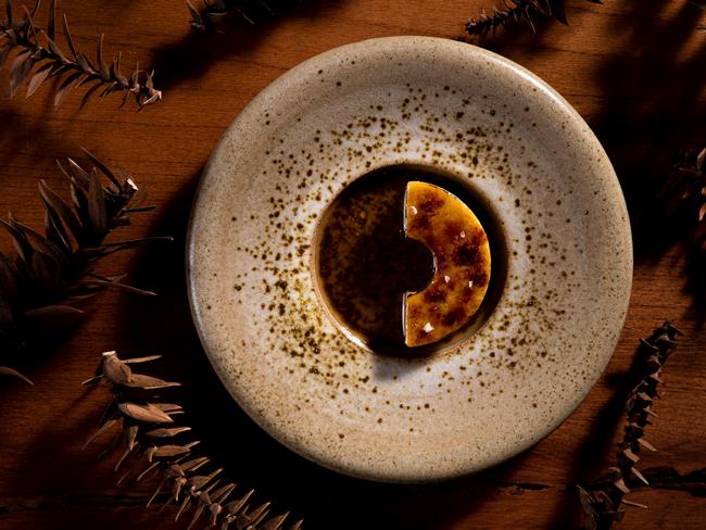 Fallen bunya bunya branches with native thyme at Restaurant Botanic, Adelaide. Picture Jon Wah