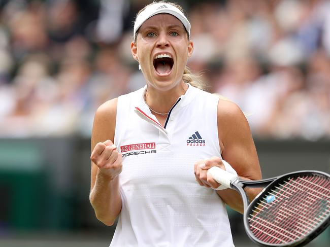 Germany's Angelique Kerber celebrates winning a point against Russia's Daria Kasatkina during their women's singles quarter-final match on the eighth day of the 2018 Wimbledon Championships at The All England Lawn Tennis Club in Wimbledon, southwest London, on July 10, 2018. / AFP PHOTO / Daniel LEAL-OLIVAS / RESTRICTED TO EDITORIAL USE