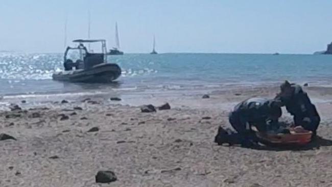 Hannah Papps is treated after the shark attack in the Whitsundays. Picture: RACQ Rescue/AAP