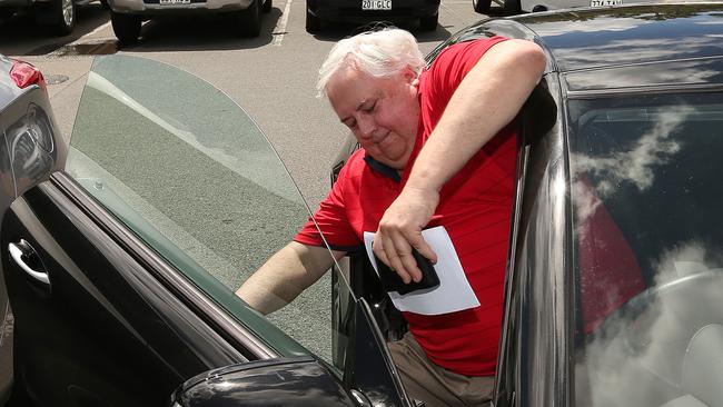 2016: Clive Palmer gets into his car after leaves a restaurant after lunch with a friend at Sanctuary Cove on the Gold Coast. Picture: Lyndon Mechielsen/The Australian