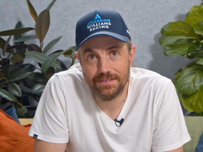 Atlassian co-founder and chief executive Mike Cannon-Brookes dons an Atlassian Williams Racing cap as he announces the new partnership.