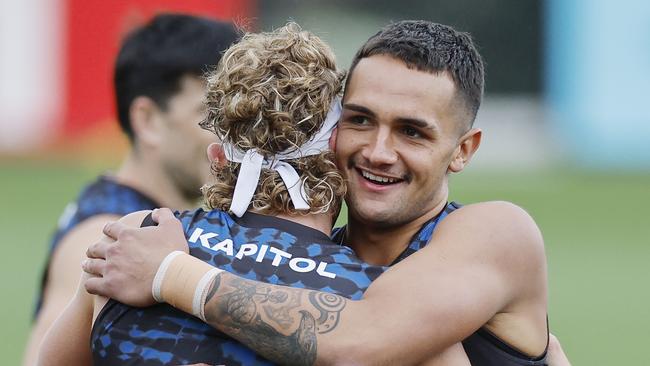 NCA. MELBOURNE, AUSTRALIA. 19th February, 2025 . Western Bulldogs training at the Whitten Oval.   Bulldog Jamarra Ugle-Hagan hugs  Aaron Naughton at training today   .  Picture: Michael Klein