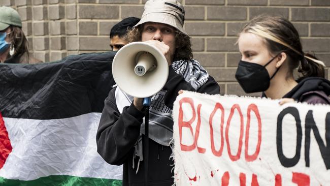 Pro-Palestinian activists block access to a University of Melbourne building. Picture: Matt Hrkac