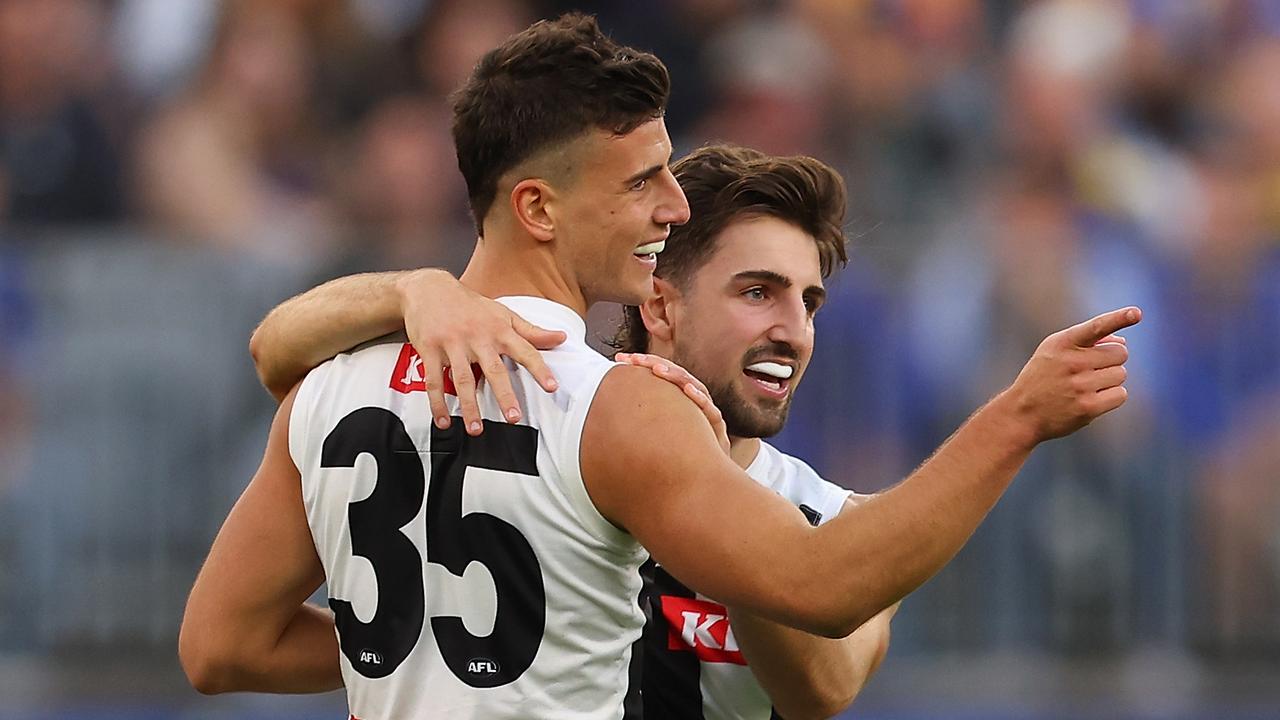 PERTH, AUSTRALIA - JUNE 03: Nick Daicos and Josh Daicos of the Magpies celebrate a goal during the round 12 AFL match between West Coast Eagles and Collingwood Magpies at Optus Stadium, on June 03, 2023, in Perth, Australia. (Photo by Paul Kane/Getty Images)