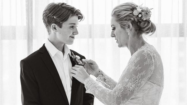William Pfeiffer, who died suddenly in his sleep at 14, with his mum on her wedding day. Picture: Supplied