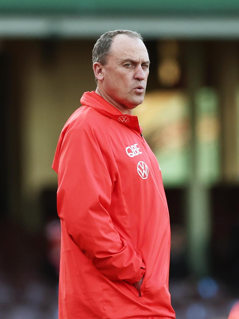 John Longmire will carry on at the Swans.