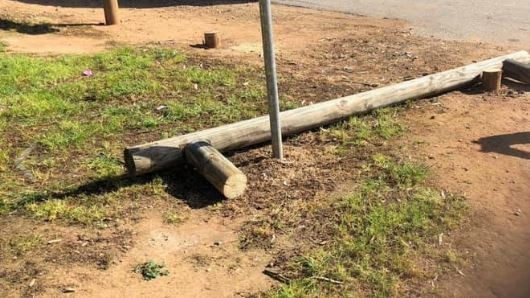 Vandals used a chainsaw to cut log fencing. Pictures: David Hood