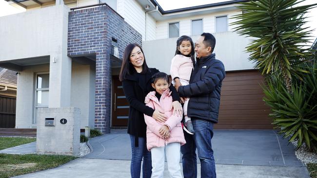 Danny Lo and Stephany Yahya, with kids Eleanor and Aerin, recently refinanced. Picture: Tim Hunter.