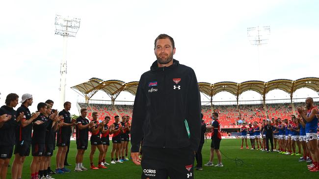 Tom Bellchambers of the Bombers walks off the field after retiring during the round 18 AFL match between the Essendon Bombers and the Melbourne Demons at Metricon Stadium on September 19, 2020 in Gold Coast, Australia. (Photo by Quinn Rooney/Getty Images)