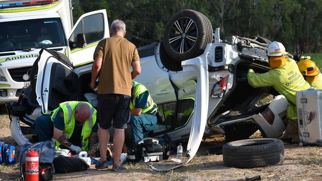 Emergency services respond to a single-vehicle accident on the Bruce Highway between Ingham and Townsville. Picture: Cameron Bates