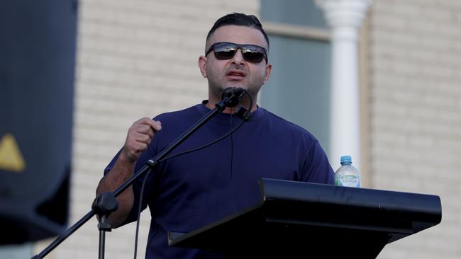 Khaled Beydoun speaks at the Hizb ut-Tahrir hosted rally outside Lakemba Mosque on Monday afternoon, on the anniversary of the October 7 attacks. Picture: Jane Dempster/The Australian.