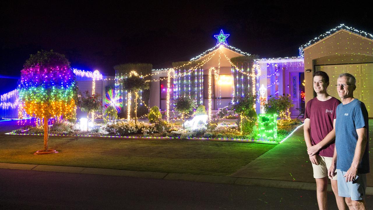 (from left) Nick and Peter Manthey outside their Banksdale Drive entry in the Christmas lights display. Monday, 4th Dec, 2018.