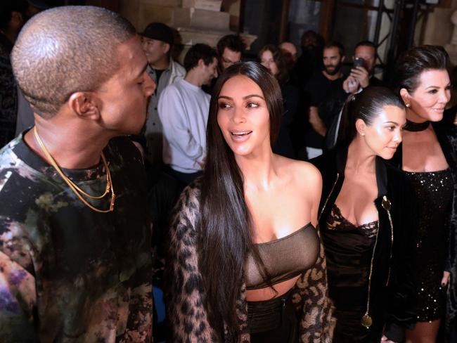 Kanye West, Kim Kardashian, Kourtney Kardashian and Kris Jenner attend the Off-white fashion show on October 2, 2016 in Paris. Picture: AFP