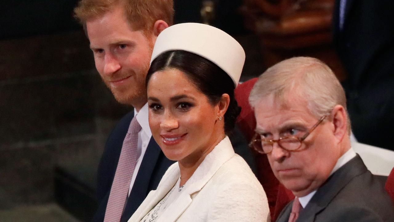 Harry, Meghan and Prince Andrew, Duke of York, who is about to drop another rung on the royal ladder. Picture: Kirsty Wigglesworth /AFP