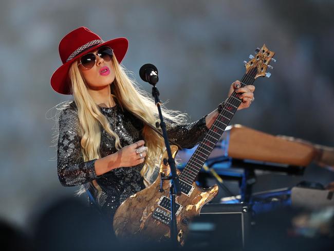 Orianthi performs with boyfriend Richie Sambora before the start of the 2016 NRL Grand Final. Picture: Brett Costello