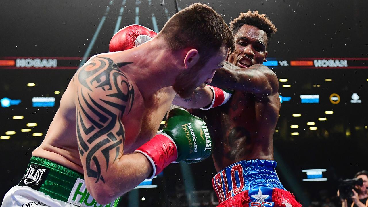 Jermall Charlo punches Dennis Hogan during their WBC middleweight title bout. Photo: Emilee Chinn/Getty Images/AFP