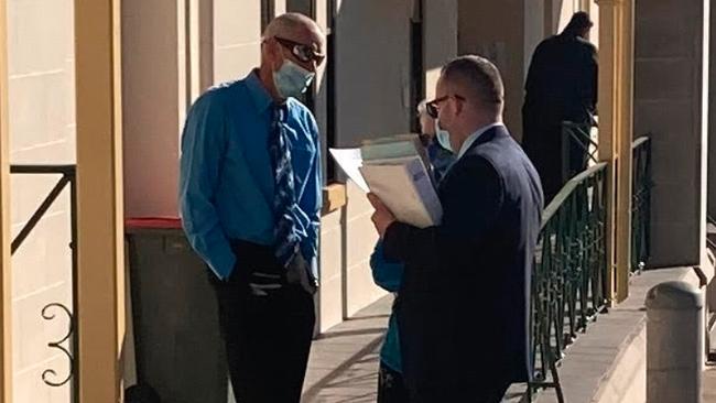 Neil Duncan (left) with his lawyer outside Bega Local Court on August 10. Picture: Alasdair McDonald