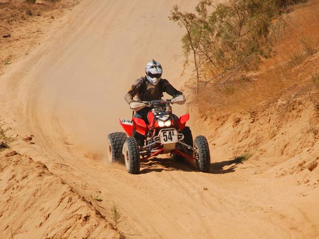 Generic image of a quad bike motorbike rider.