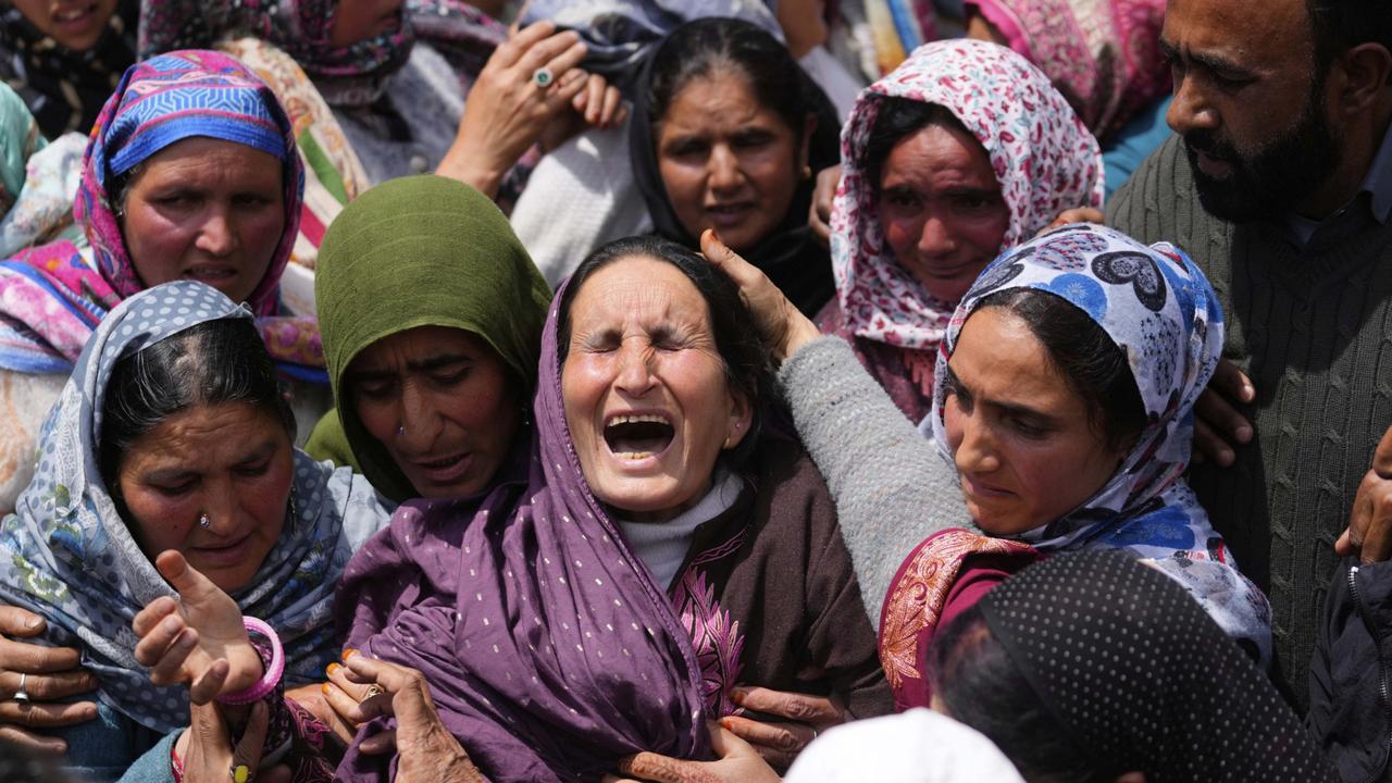Relatives wail during the funeral procession of Adil Hussain Shah, a daily-wage worker, who died when militants opened fire. Picture: AP Photo/Dar Yasin