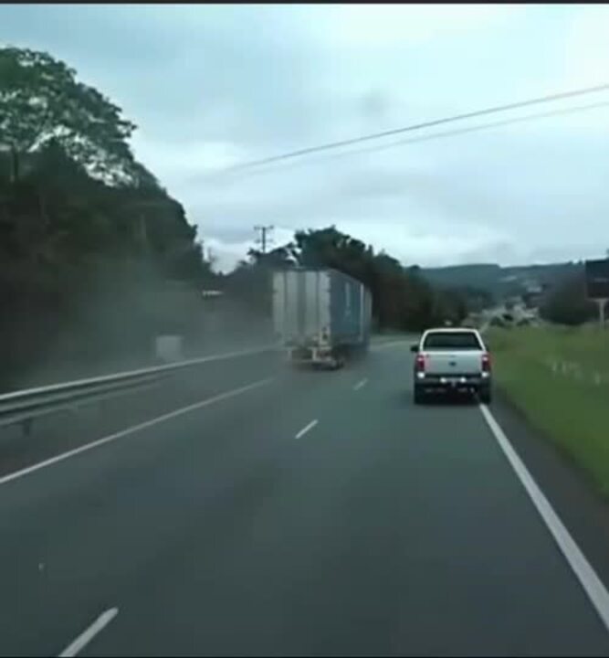 Beer truck flips on Pacific Motorway