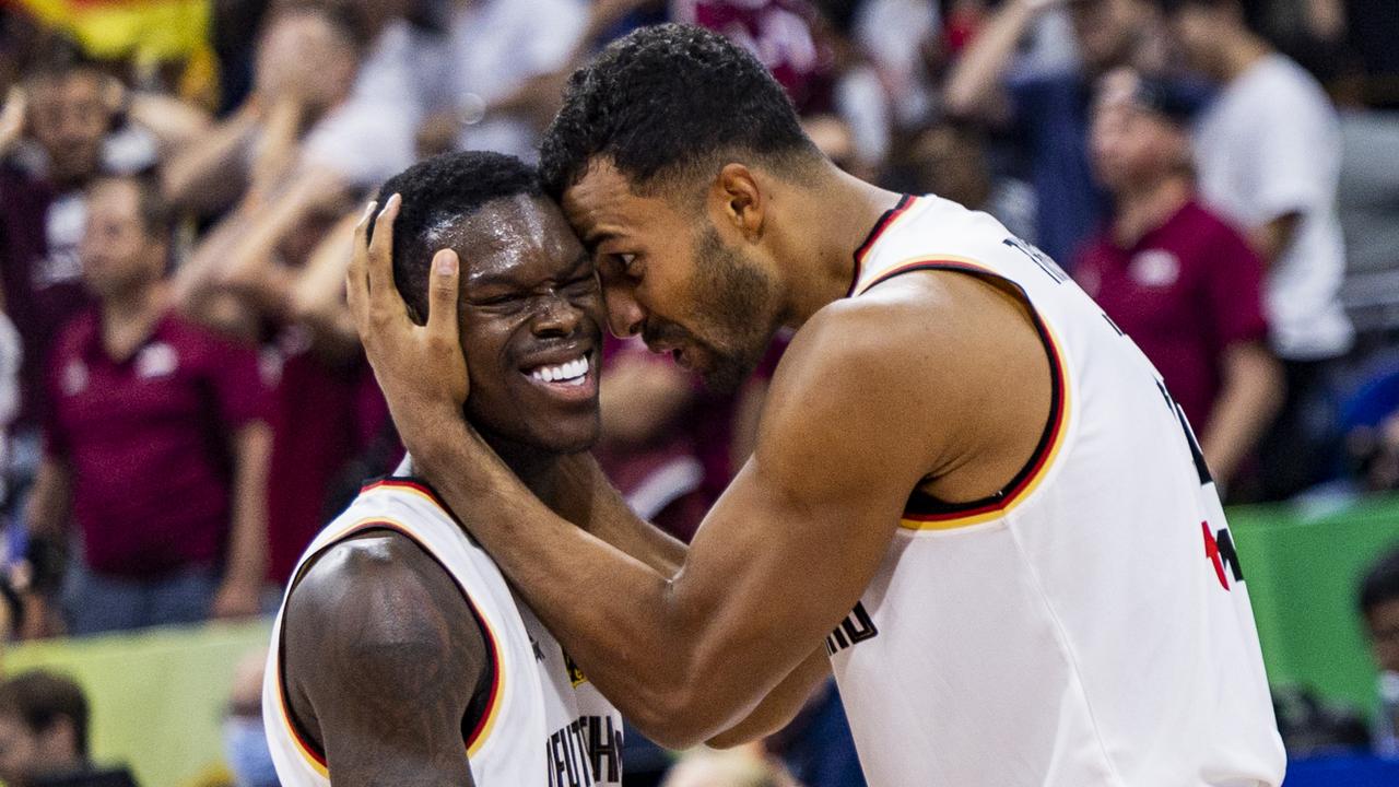 Dennis Schroder (left) struggled as Germany beat Latvia. (Photo by Ezra Acayan/Getty Images)