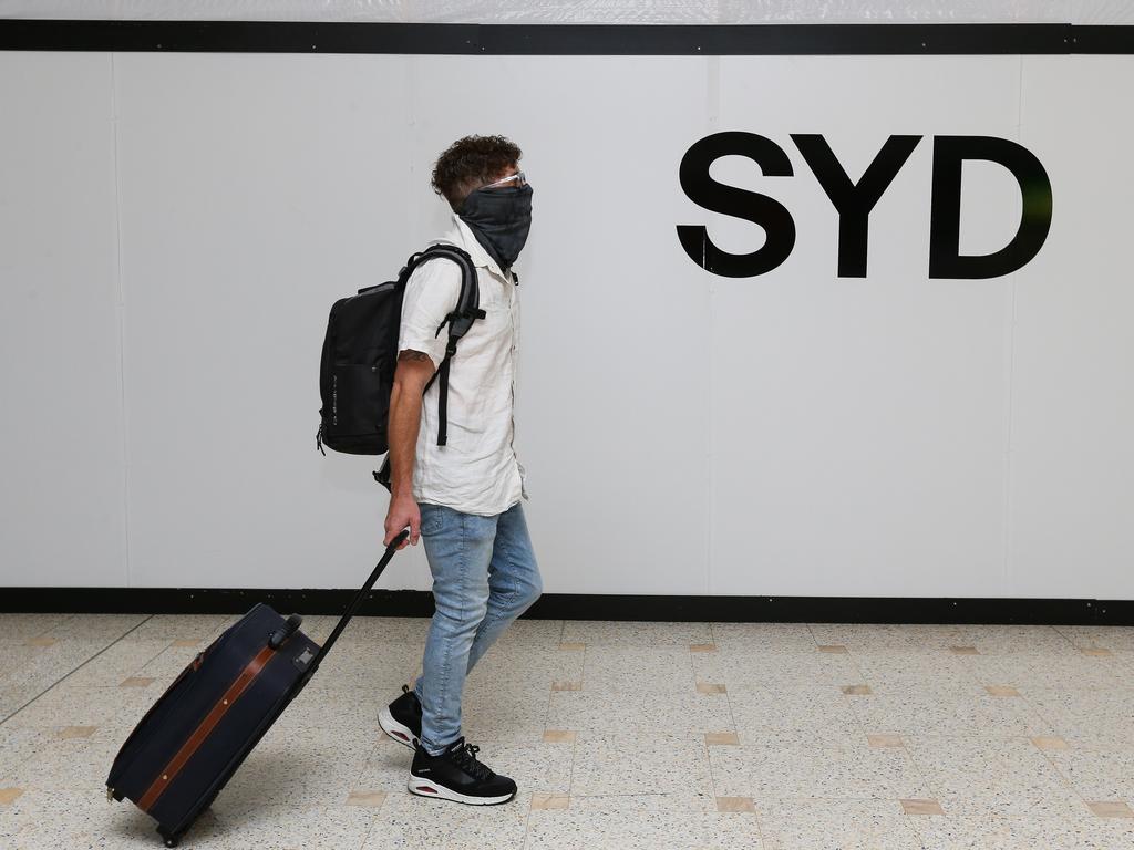 People are seen arriving into Sydney International Airport after the rules around PCR tests were changed for people travelling into Australia. Picture: NCA NewsWire /Gaye Gerard