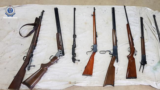 Some of the weapons, guns and ammunition seized by Strike Force Colenso investigators. Picture: NSW Police