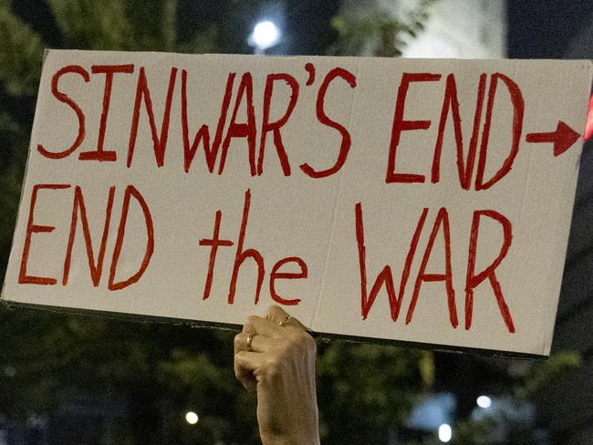 TEL AVIV, ISRAEL - OCTOBER 17: A protester holds a sign during a demonstration calling for an hostages deal on October 17, 2024 in Tel Aviv, Israel. The Hamas leader Yahya Sinwar was reportedly killed in an Israeli strike in Gaza on Thursday. Israel's Foreign Minister Israel Katz confirmed the news in a message to his global counterparts. Sinwar is widely thought to have organized the deadly attacks in Israel on October 7, 2023, and became leader of Hamas after the assassination of the group's previous leader, Ismail Haniyeh, in July. (Photo by Amir Levy/Getty Images)