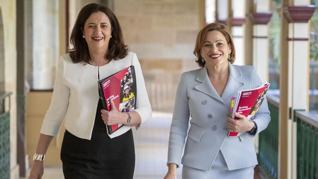 Queensland Premier Annastacia Palaszczuk and Treasurer Jackie Trad (right) walk towards a press briefing to deliver the state government's 2019-20 Queensland budget at Parliament House in June.