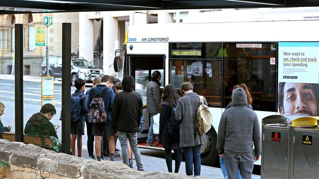 People catching a bus on Macquarie Street in Hobart. Picture: SAM ROSEWARNE.