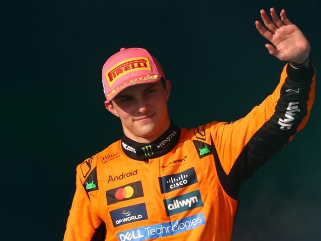 MIAMI, FLORIDA - MAY 04: Race winner Oscar Piastri of Australia and McLaren waves from the podium during the F1 Grand Prix of Miami at Miami International Autodrome on May 04, 2025 in Miami, Florida. (Photo by Clive Rose/Getty Images)