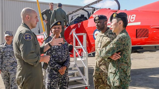 Defence officials representing India, the UK and Singapore discus Air Force capabilities and training at RAAF Pearce, Perth in May last year. Picture: CPL Robert Whitmore