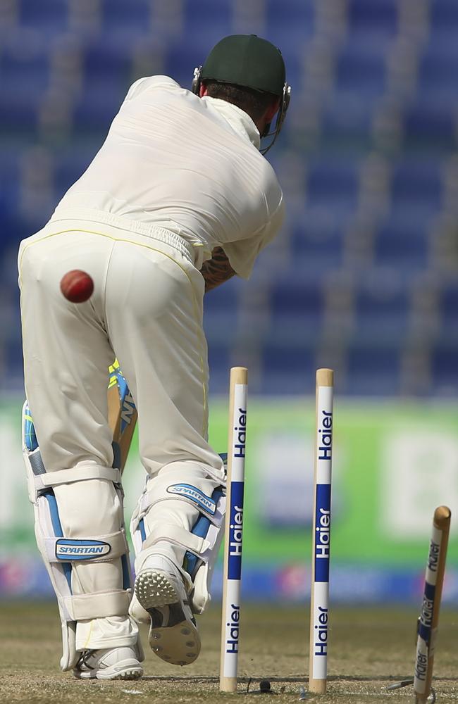 Michael Clarke is bowled by Imran Khan of Pakistan.