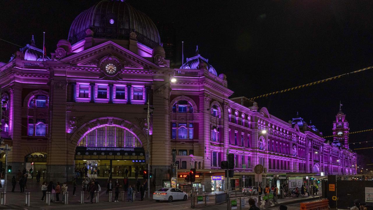 Melbourne, Australia: Flinders Street Station is lit up in purple to honour the late Queen on September 19, 2022 in Melbourne, Australia. Queen Elizabeth II died at Balmoral Castle in Scotland aged 96 on September 8, 2022. . Picture: Getty Images