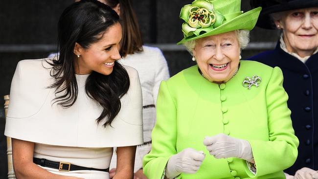 Meghan has rocked a caped gown with the Queen in the past. Picture: Getty Images.