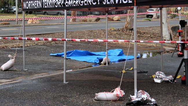 Police on the scene of an alleged aggravated assault on Gap Road in Alice Springs overnight which left an elderly man fighting for his life in hospital. October 4, 2022. Picture: Jason Walls