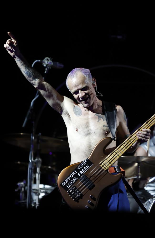 Red Hot Chili Peppers’ Flea on stage at Accor Stadium. Picture: Jonathan Ng