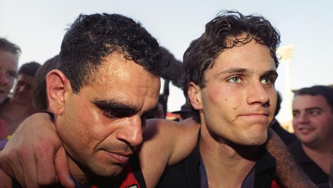 Michael Long and Gavin Wanganeen after winning the 1993 grand final.